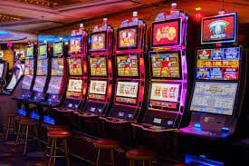 Video slot game reels with bonus feature symbols on 9ajili